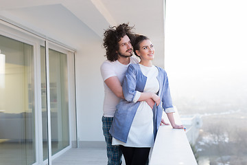 Image showing Couple hugging on the balcony