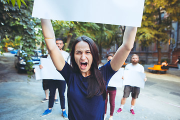 Image showing Group of protesting young people outdoors