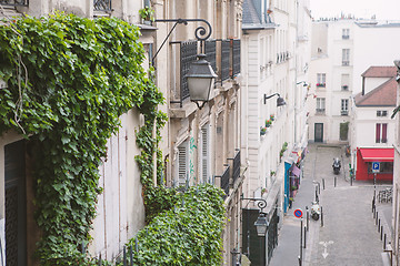 Image showing Paris, France - May 22, 2012: View from the heights, to the street and houses of the city on a spring afternoon