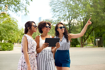 Image showing women with tablet pc on street in summer