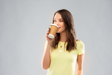 Image showing young woman or teenage girl drinking coffee