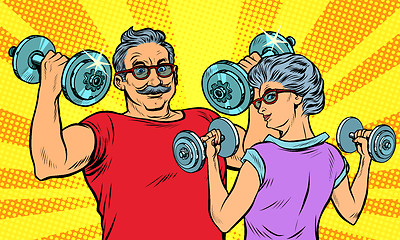 Image showing an elderly man and woman grandma grandpa retired in sports, fitness dumbbell