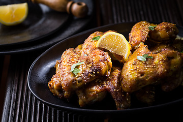 Image showing Spicy chicken wings with garlic and lemon marinade