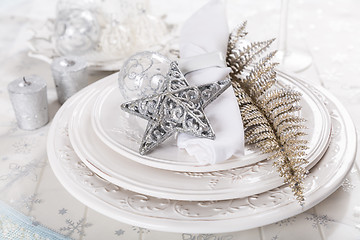 Image showing Festive table setting with silver star on plate