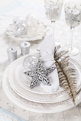 Image showing Festive table setting with silver star on plate