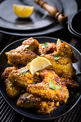 Image showing Spicy chicken wings with garlic and lemon marinade