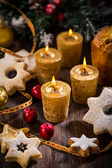 Image showing Christmas still life with homemade cookies and candles