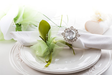 Image showing Festive table setting with bouquet on plate