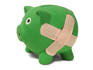 Image showing Piggy bank with band-aid