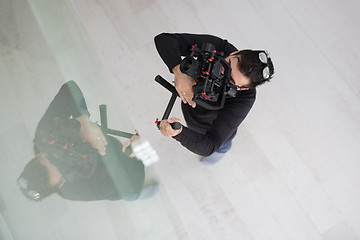 Image showing videographer at work