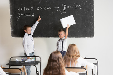 Image showing School children in classroom at lesson