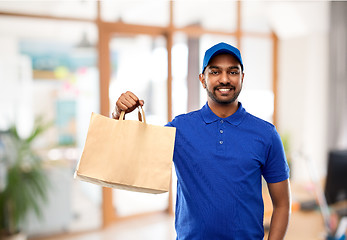 Image showing delivery man with food in paper bag at office