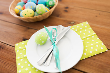 Image showing close up of table setting and easter eggs