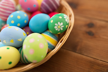 Image showing close up of colored easter eggs in basket