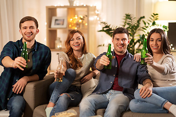 Image showing friends toasting non-alcoholic beer at home