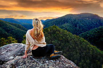Image showing Woman mountain gazing at sunset