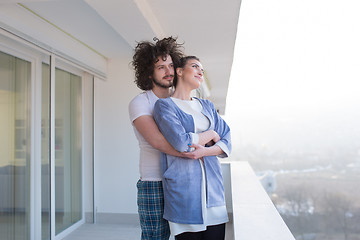 Image showing Couple hugging on the balcony