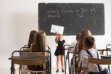 Image showing School children in classroom at lesson