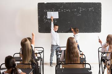 Image showing School children in classroom at lesson