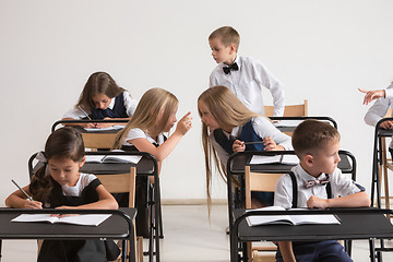 Image showing School children in classroom at lesson