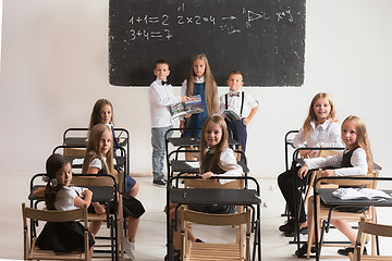 Image showing School children in classroom at lesson