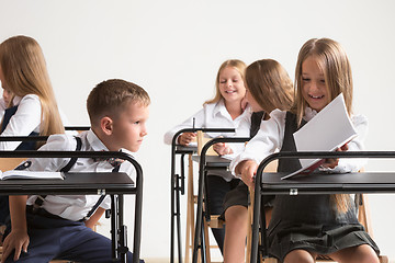 Image showing School children in classroom at lesson