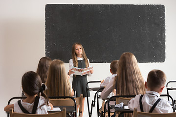 Image showing School children in classroom at lesson