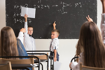 Image showing School children in classroom at lesson