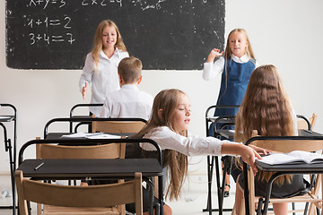 Image showing School children in classroom at lesson