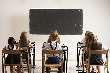 Image showing School children in classroom at lesson