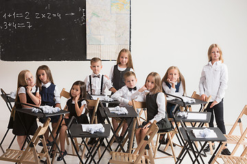 Image showing School children in classroom at lesson