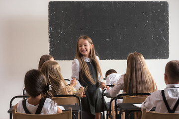 Image showing School children in classroom at lesson