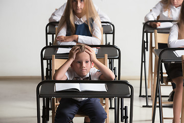 Image showing School children in classroom at lesson