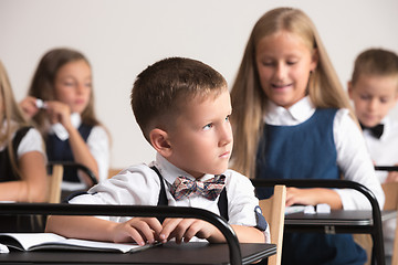 Image showing School children in classroom at lesson