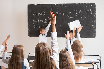 Image showing School children in classroom at lesson