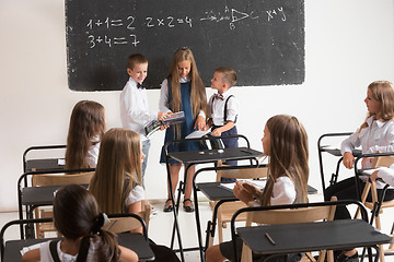 Image showing School children in classroom at lesson