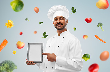 Image showing happy male indian chef with tablet computer