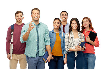 Image showing group of smiling students showing ok hand sign