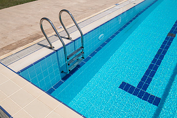 Image showing Grab bars ladder in the swimming pool