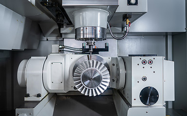 Image showing Metalworking CNC lathe milling machine. Cutting metal modern pro