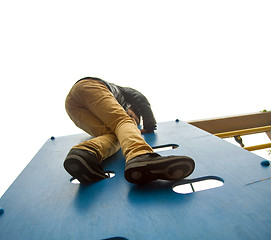 Image showing Boy climbs to the top