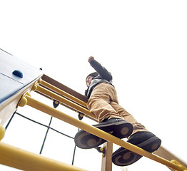 Image showing Boy climbs to the top