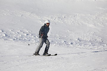 Image showing Skiing in the winter snowy slopes