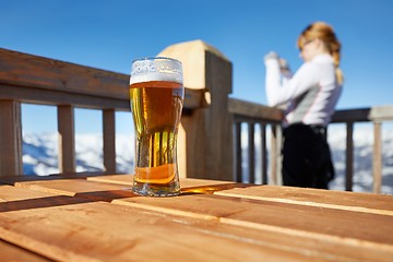 Image showing Having a beer on a terrace with scenic view