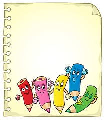 Image showing Notepad page with happy wooden crayons