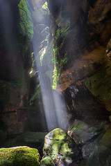 Image showing Light beams into the canyon