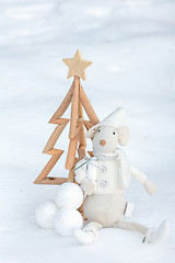 Image showing Christmas tree and decorations in the snow