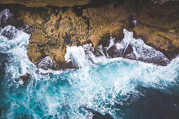 Image showing Views of waves tossing around rocks in the ocean