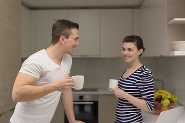 Image showing couple with laptop computer enjoying morning