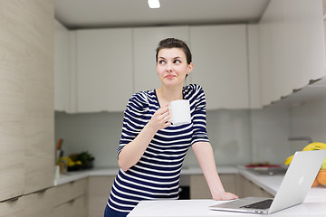 Image showing woman drinking coffee enjoying relaxing lifestyle